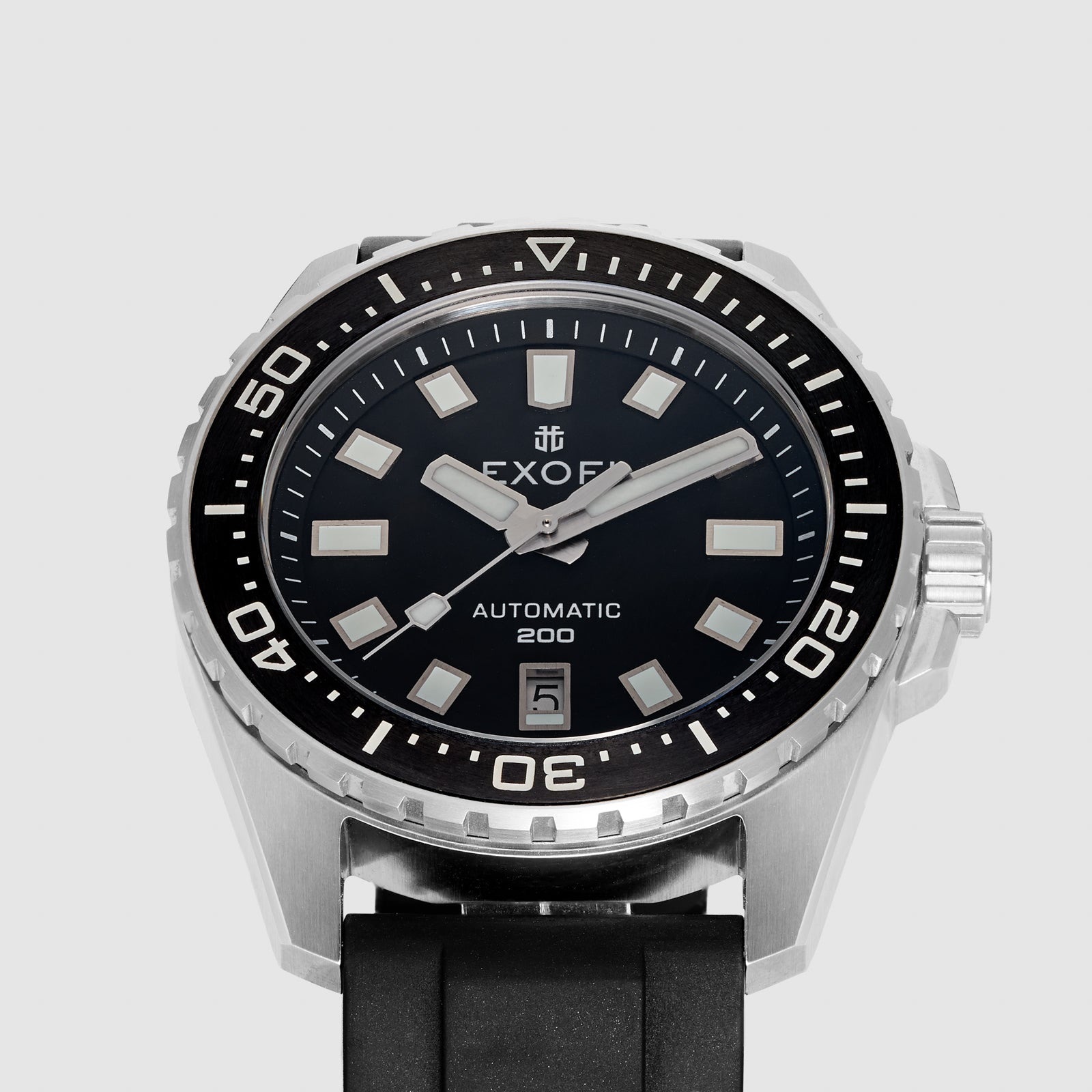 Close view of the EXOFI Wolf Rock 42 dial, applied markers and ceramic bezel